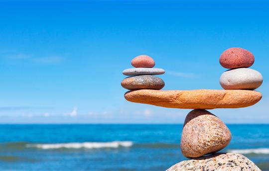 Balance stones against the sea