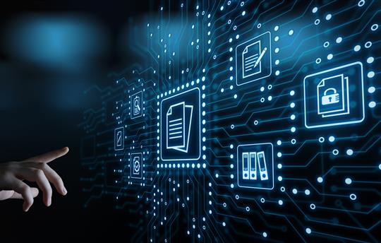finger pointing toward electronic files