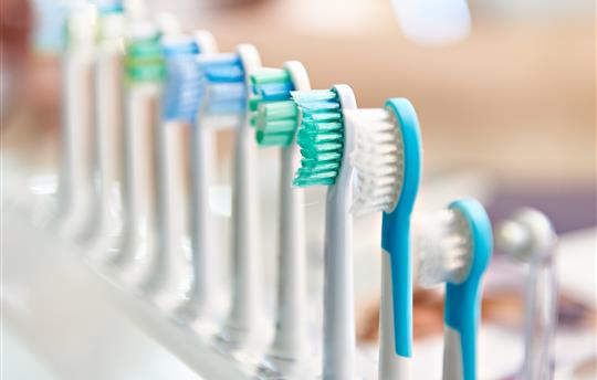 Nozzles for electric toothbrushes