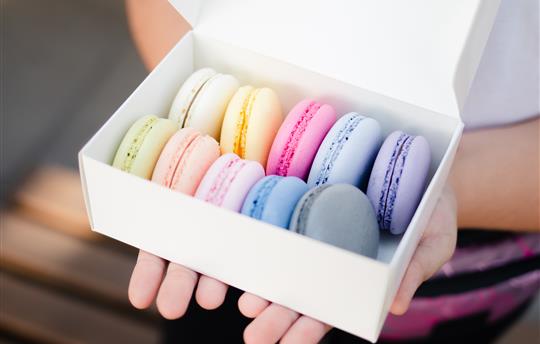 White box of colorful cookies