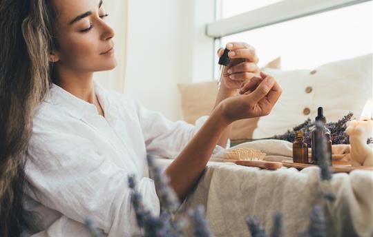 Woman uses essential oils