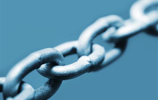 metal chain on blue background