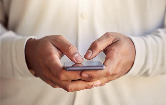 Up-close of person holding phone