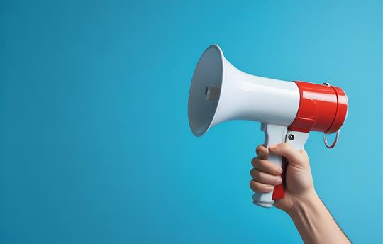 megaphone on bright background
