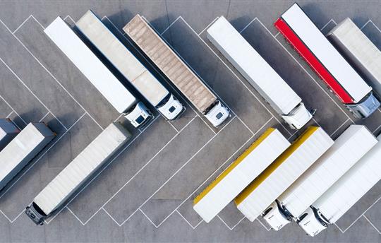 Large Group of Trucks at Truck Stop, Aerial View