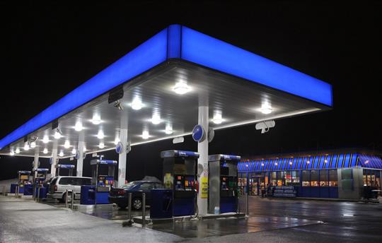 Illuminated Modern Fuel Service Station at night