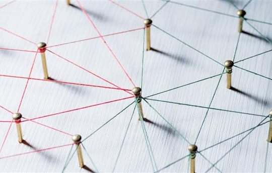 Colorful web of thin thread on white background