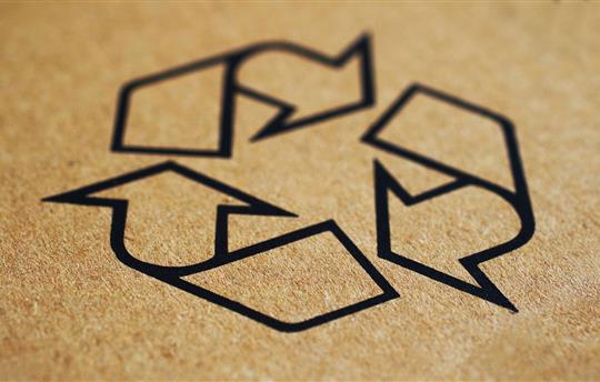 Recycle logo printed on paperboard packaging