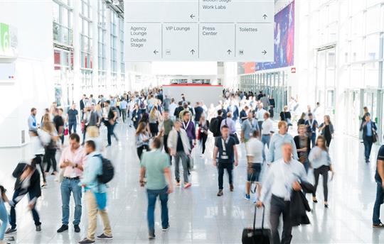 blurred people at a trade show